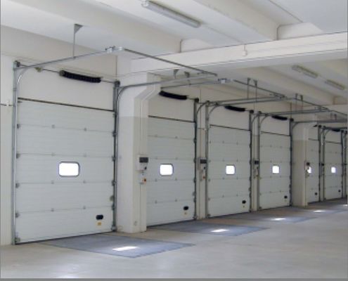 Rupture gravante en refief extérieure des portes 55m/S sectionnelles industrielles maximum de charge de vent anti