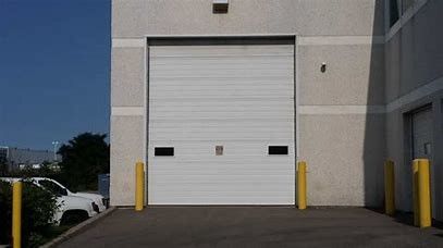 La porte sectionnelle industrielle de la caserne de pompiers 3000x3000 a enduit le panneau en acier du sandwich 40mm